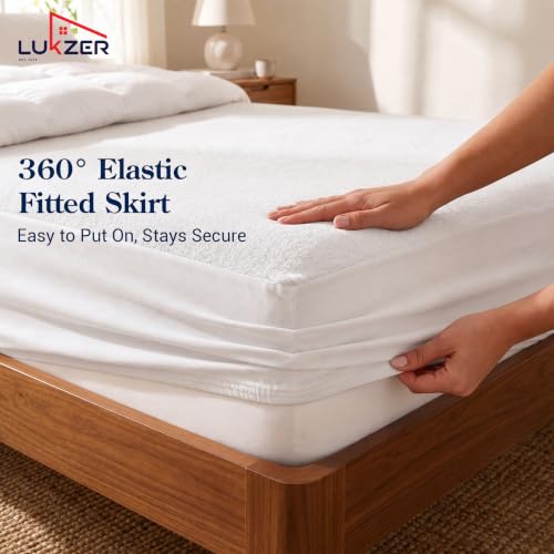 Image of Lukzer Waterproof Mattress Protector White Queen Size 72 x 60 Inches (6 x 5 ft) Ultra Soft Terry Cotton Feel Fabric with Elastic Skirting Hypoallergenic and Breathable Mattress Cover