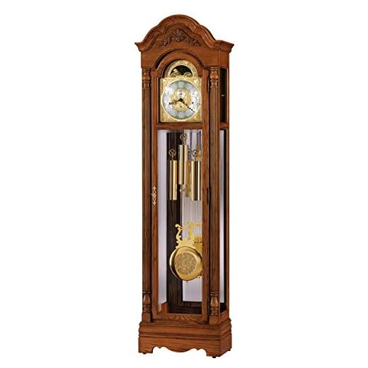 Howard Miller Gavin Floor Clock 610-985 - Illuminated Oak Yorkshire Vertical Grandfather Home Decor with Cable-Driven, Single-Chime Movement