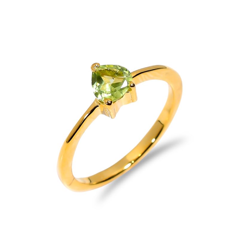 Bague péridot naturel finie la grisaille avec cette pierre précieuse taillée main