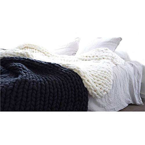 Plaid grosse maille tricoté main pour un canapé ou lit douillet