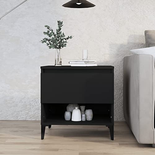 Table basse noire en bois compacte pour optimiser les petits salons