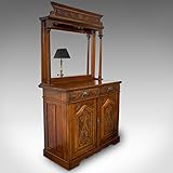 jugendstil schrank Mit silberfarbenen Nickel-Griffen über geformten Rücken.