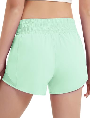 EXARUS Short esportivo para meninas, 6,3 cm/10,2 cm, pista de corrida com bolso com zíper, leve, aca