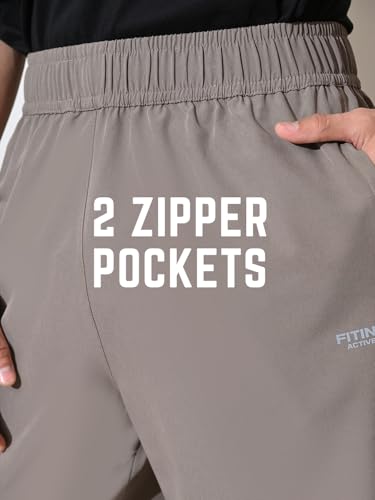 Image of FITINC Men's All-Season Relaxed Fit Track Pants | Stretchable Gym Lower with 2 Deep Zipper Pockets | Quick-Dry Athletic Joggers for Running, Workout & Yoga