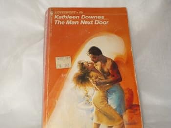 Paperback The Man Next Door Book