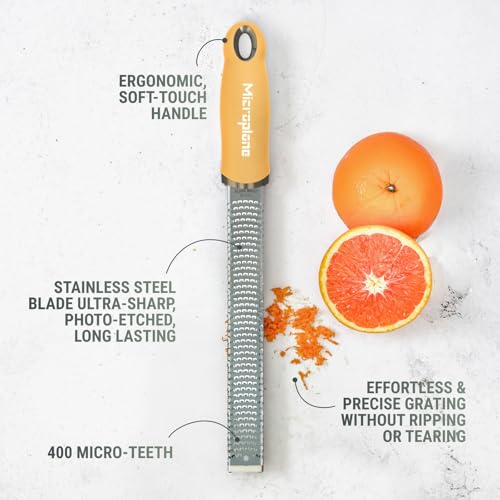Image of Microplane Premium Classic Zester Grater in Lemon Cream color - Vibrant Color | Lemon Zester tool, Cheese & Vegetable Grater | For Citrus, Parmesan Cheese, Garlic, Ginger | Fine Stainless Steel Blade