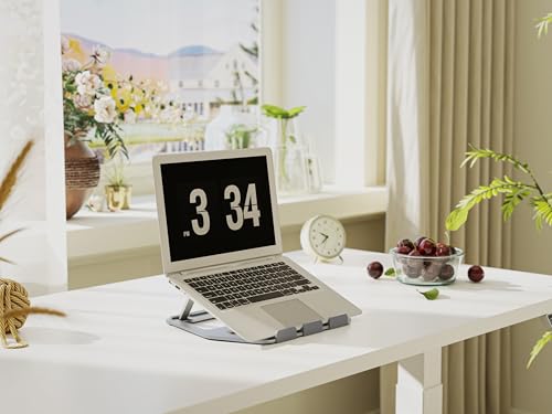 Image of Amazon Basics Aluminum Portable Foldable Height Adjustable Laptop Stand for Devices up to 13 inch, Silver