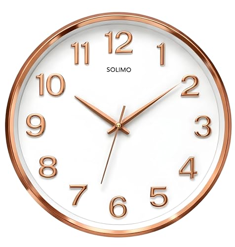 Image of Amazon Brand - Solimo 12 Inches Silent Wall Clock for Living Room Bedroom Office Plastic Easy to Read 3D Numbers Modern Stylish Sweep Movement Wall Clock for Home 1603DX (Rose Gold)