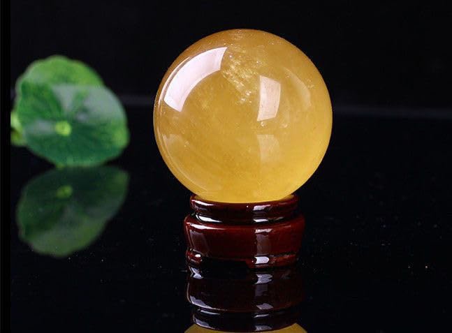 Cristal de quartz en boule de 110mm pour harmoniser le salon