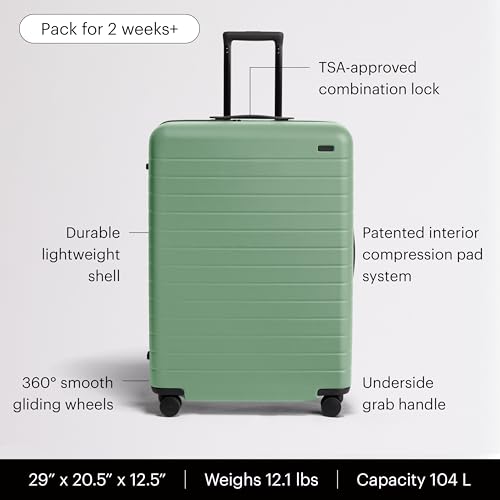 Image of Away Large Checked Luggage - 29-Inch Lightweight Hardside Suitcase with Four WhisperGlide 360 Spinner Wheels, Interior Compression System, TSA-Accepted Lock - Sea Green