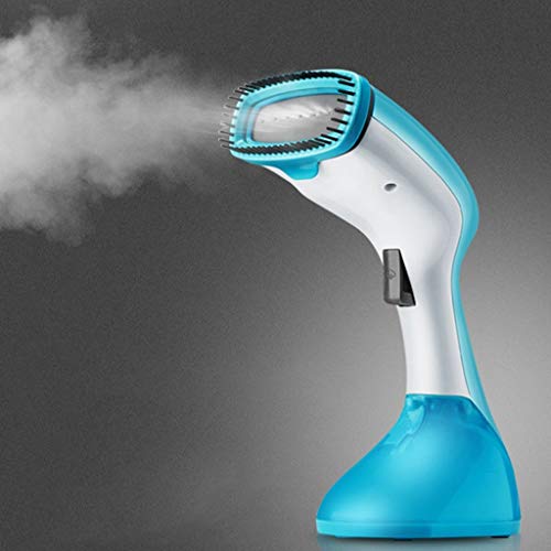 Machine de repassage à vapeur portative MU Maison mini fer tenue dans la main
