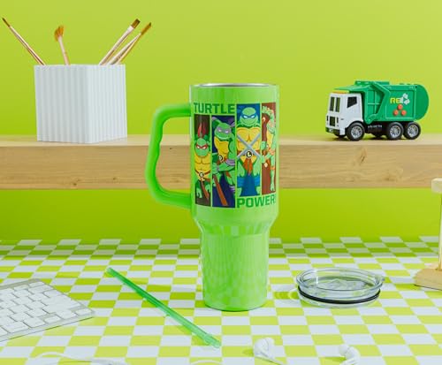 Image of Silver Buffalo Teenage Mutant Ninja Turtles Turtle Power Stainless Steel Tumbler with Handle Featuring Leonardo, Donatello, Raphael, and Michelangelo, Fits in Standard Cup Holder, 40 Ounces