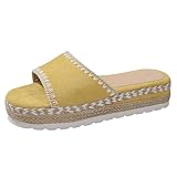 Fabriquée avec un détail classique de corde d'espadrille enroulée autour de la tige, elle offre un look d'été intemporel et élégant.