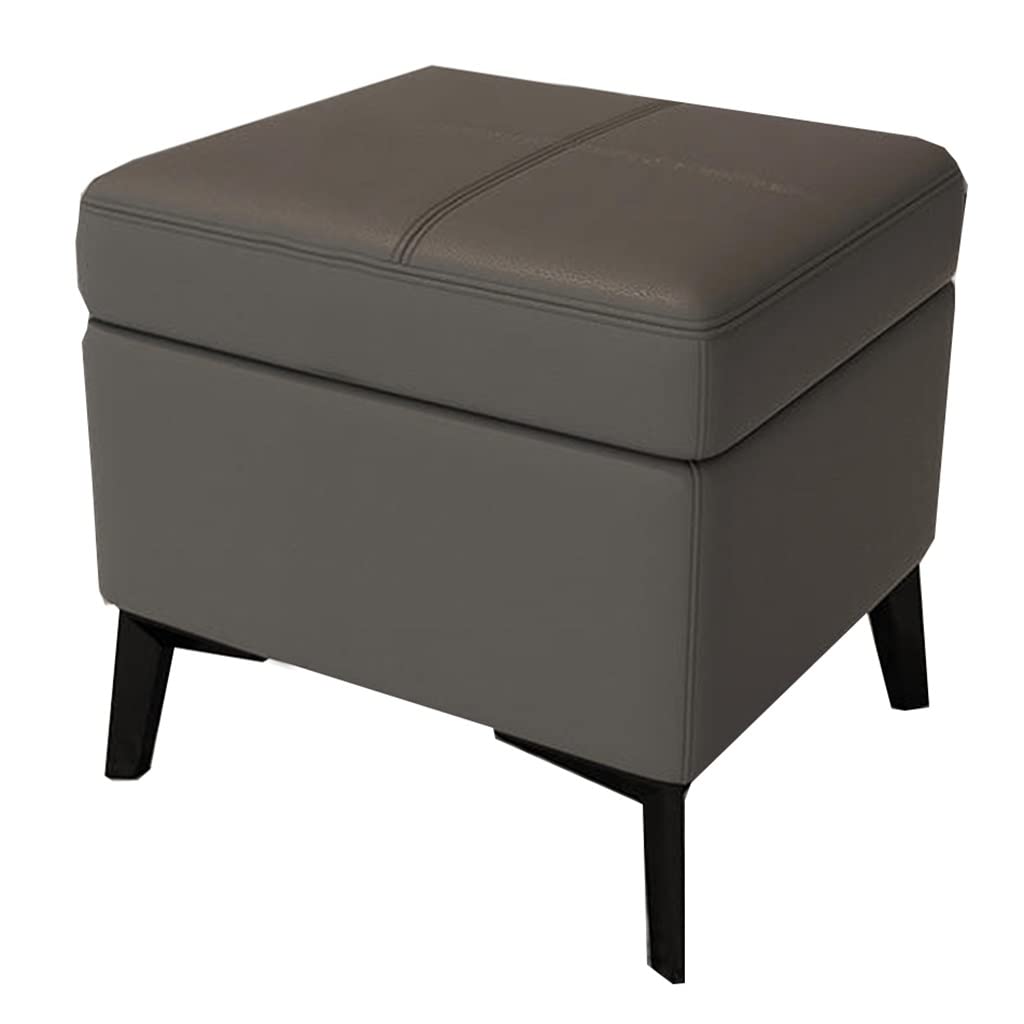 Pieds en bois et cuir de qualité pour ce tabouret coffre design