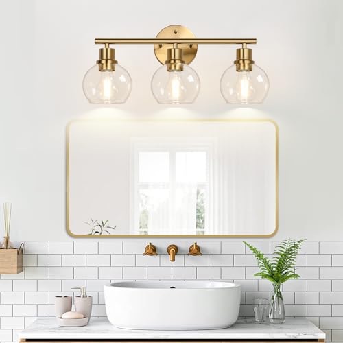 Image of Indoi 3-Light Bathroom Light Fixtures, Brushed Gold Modern Vanity Lights Over Mirror with Clear Glass Globe Shade, Bathroom Wall Sconces for Mirror Kitchen Living Room Hallway Cabinet Bedroom Porch