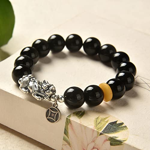 Bracelet obsidienne noire au travail pour cultiver la sérénité et le succès