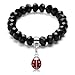 Produktbild Morella Damen Bettelarmband mit schwarzen Glasperlen und Charms Anhänger Marienkäfer in Samtbeutel
