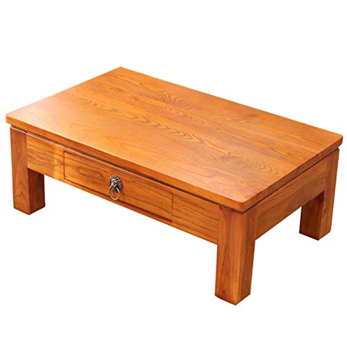 Table basse en bois avec tiroirs de rangement pour optimiser un petit salon
