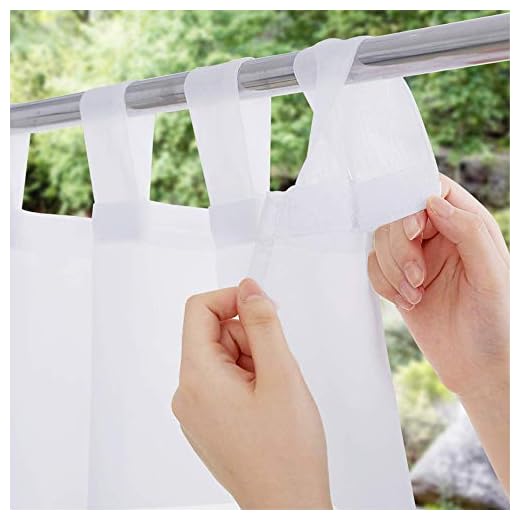21+ Creative Balcony Privacy Ideas You’ll Love 3 NICETOWN 2 Panels White Sheer Outdoor Curtains for Patio Waterproof, Detachable Sticky Tab Top Elegant Sheer Drapes Easy Hanging for Porch/Party, W54 x L84, White