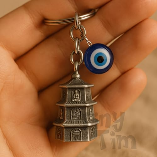 Image of Tiny Tim Guardian Bell with Evil Eye Charm - Protective Motorcycle & Car Accessory - Tibetan-Inspired Design - Wards Off Negative Energy - Ideal Gift for Bikers & Travelers