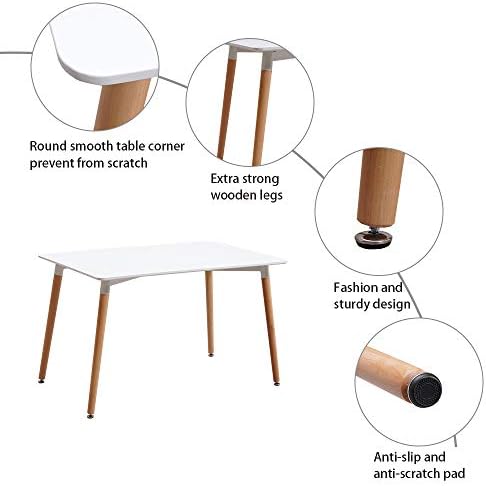 A lifestyle shot of the 120cm dining set used as a workspace with a laptop and a cup of coffee on the smooth tabletop.