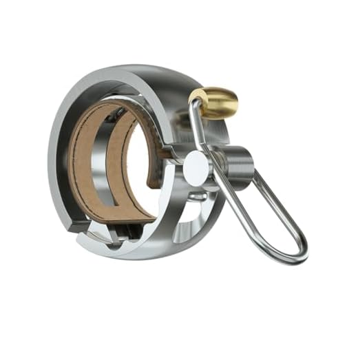 Best Bike Bell Amazon Buying Guide - Bike Accessories Knog Oi Luxe Bike Bell Silver – Sleek Low Profile Bicycle Bell for Adults, Durable Metal & Vegan Leather, Clear Tone, Easy Install for Flat Bars & Drop Bars (Small 22.2mm / Large 23.8–31.8mm)