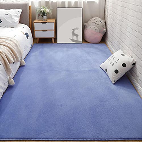 Grand tapis LUNEZY moderne bleu au design abstrait et finitions durables