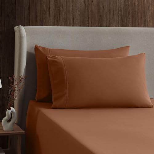 Image of Nestl Short Queen Bed Sheet Set - Rust - 4-Piece Deep Pocket | Instantly Soft, Night-One Ready (No Wash Required). Fits 16-Inch Deep Pockets, 360-Degree Elastic Grip