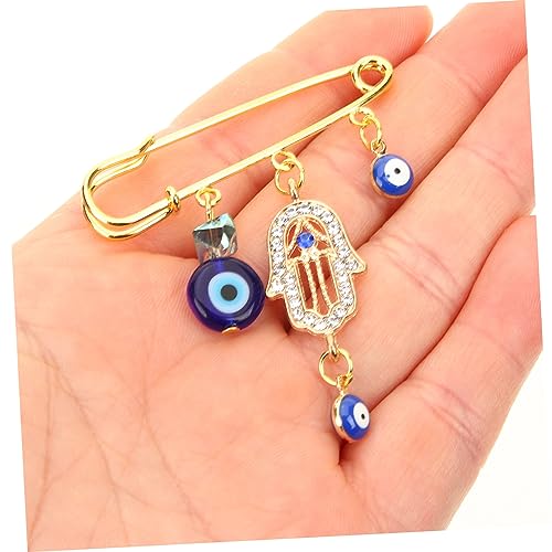 Mal de ojo pin de chal ideal para abrigarse en bodas de invierno 4