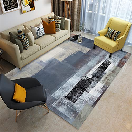 Deco de chambre ado fille : tapis bleu géométrique et moderne