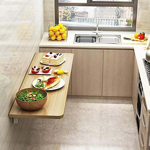 Table suspendue pliante pour rompre le manque de place en studio et bureau