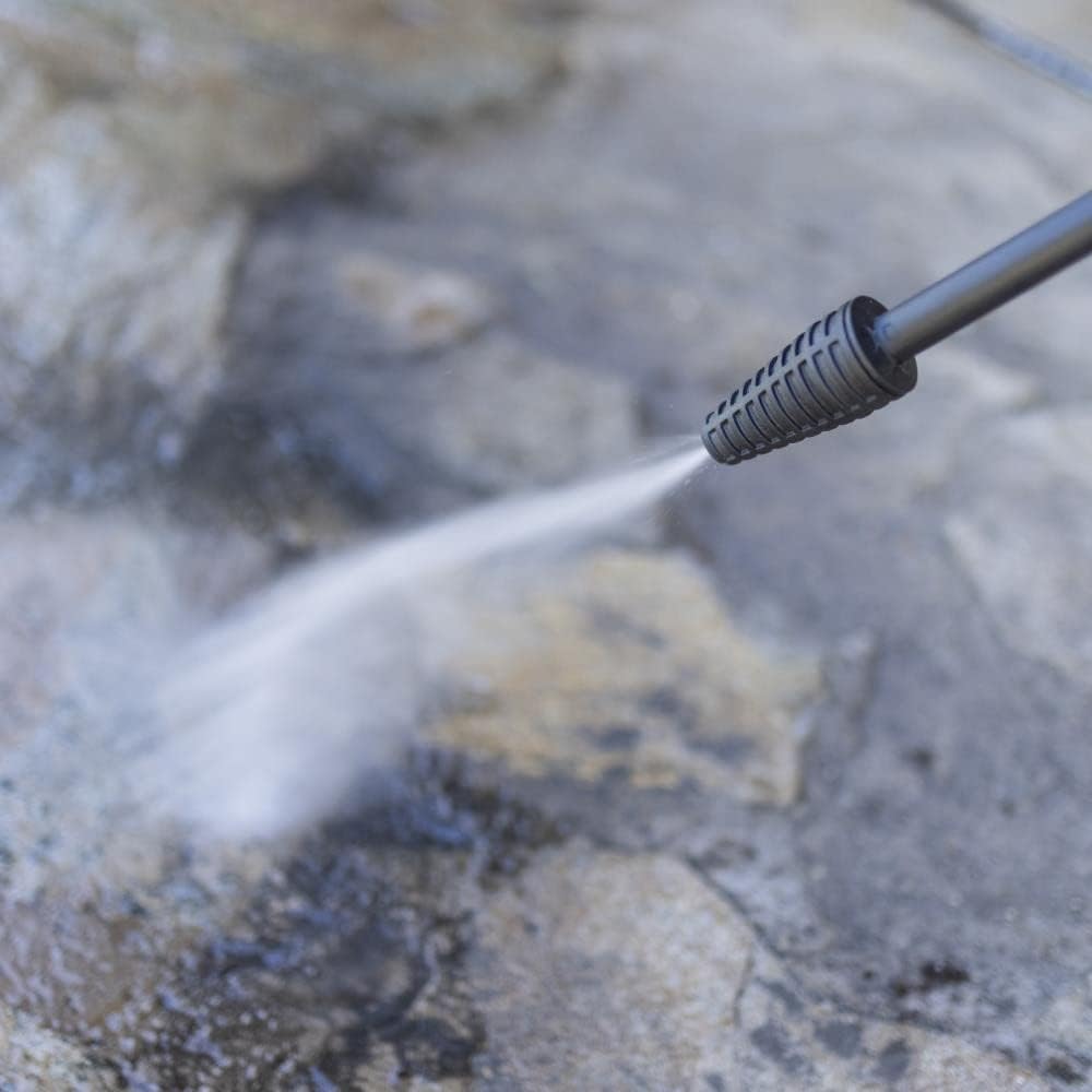 Close-up of pressure washer spray pattern