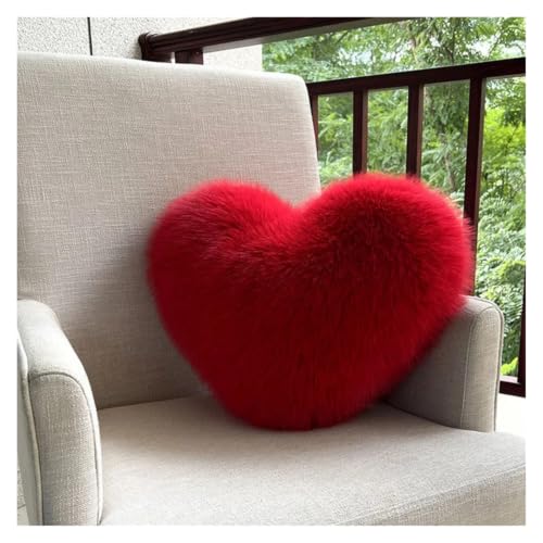 Oreiller en forme de cœur pour sublimer le canapé du salon et la chambre