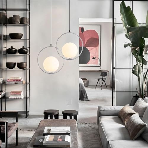 Suspension globe dorée moderne pour illuminer un salon chic