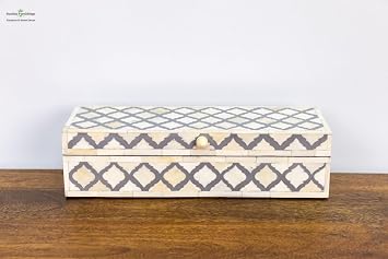 Gray and white long rectangle bone inlay box with geometric pattern.