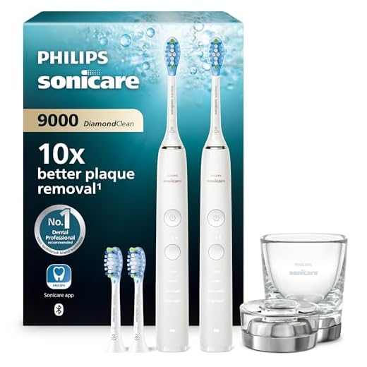 Philips Sonicare DiamondClean 9000 Elektrische Zahnbürste Doppelpack - 2 Schallzahnbürsten, 1x Ladeglas, 4x Premium Bürstenköpfe, neue Generation, weiß & weiß (Model: HX9914/62)