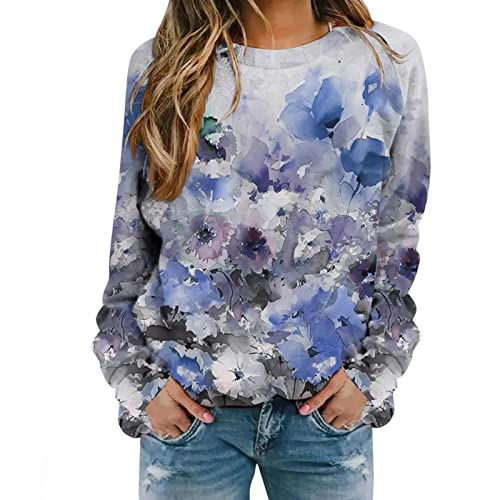 Sweat ample épissure bleu avec son motif floral unique et ses manches longues