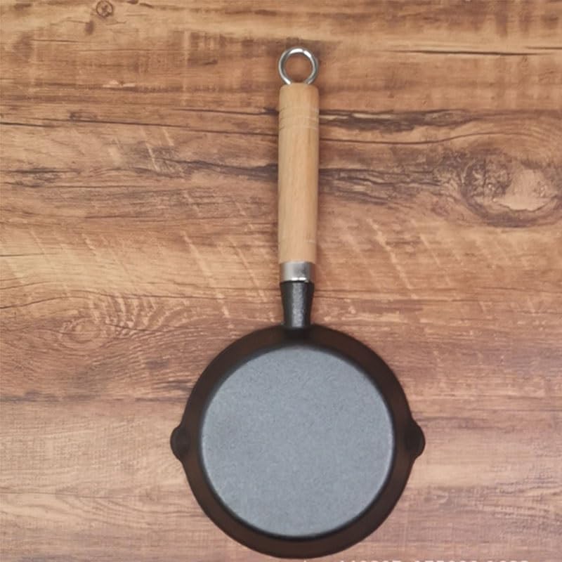 Cast Iron Fried Egg Dumplings Poured Hot Oil to Fry Eggs in A Flat bottomed Pan with An Induction Cooker