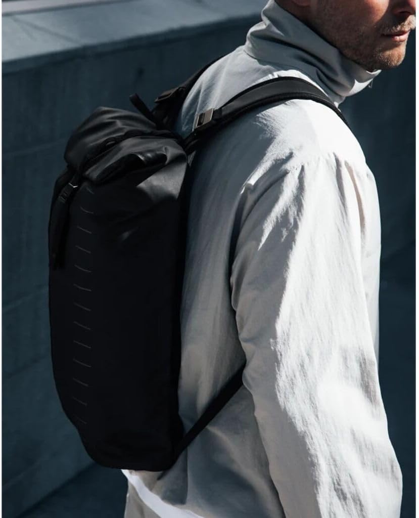 Db Journey Essential Backpack - Travel Backpack with Laptop Compartment for Work, and Gym, Lightweight, Roller Bag Attachment, 12L - Black Out