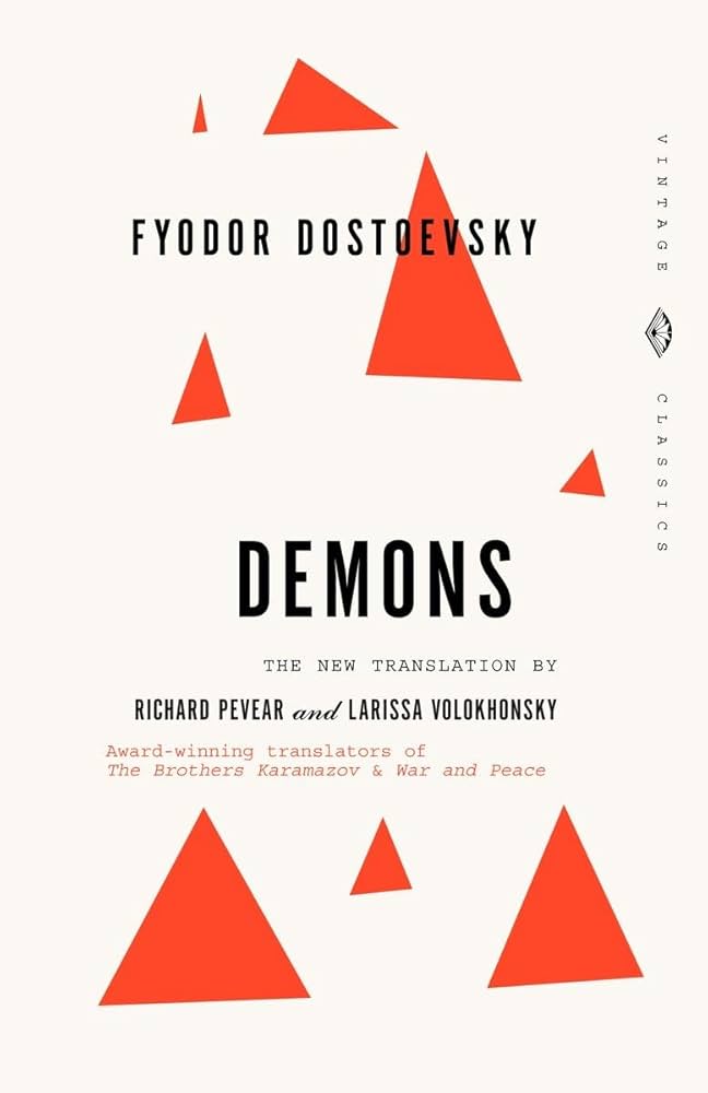 cover with a bunch of small red triangles on a white background