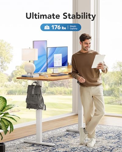 Image of HUANUO Electric Standing Desk, Whole Piece Desktop, Adjustable Height Computer Desk, 4 Height Memory Settings, Sit Stand Up Desks for Home Office, 60 inch x 24 inch, Light Vintage