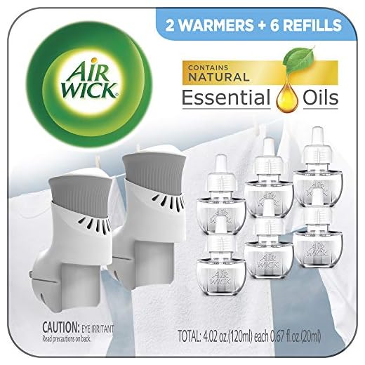 Air Wick Plug in Scented Oil Starter Kit, 2 Warmers + 6 Refills, Fresh Linen, Same Familiar Smell of Fresh Laundry, Eco Friendly, Essential Oils, Air Freshener
