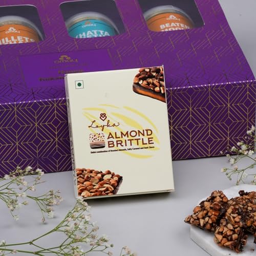 Image of Omay Foods Delicious Delicacies Rakhi Gift Hamper for Bhaiya Bhabhi | 8 Pcs | Roasted Snacks, Dry Fruits, Chocolate & Premium Kundan Couple Rakhi with Lumba | Rakhi Gift for Brother and Bhabhi