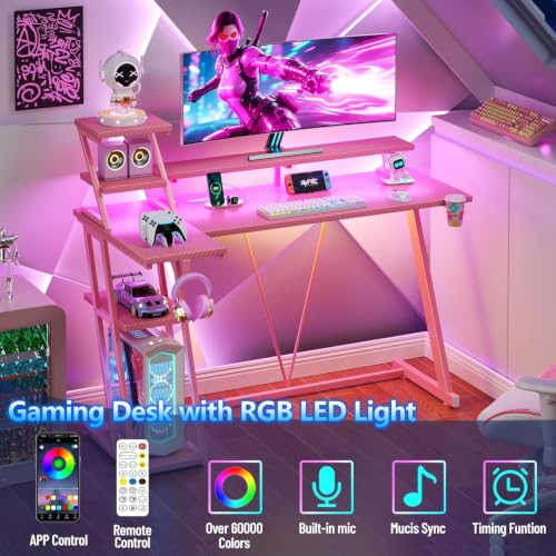 Image of Korfile 40 Inch Pink Gaming Desk with LED Lights & Power Outlet, Small Gaming Computer Desk with Storage Shelves, L Shaped Gamer Workstations with Monitor Stand for Bedroom