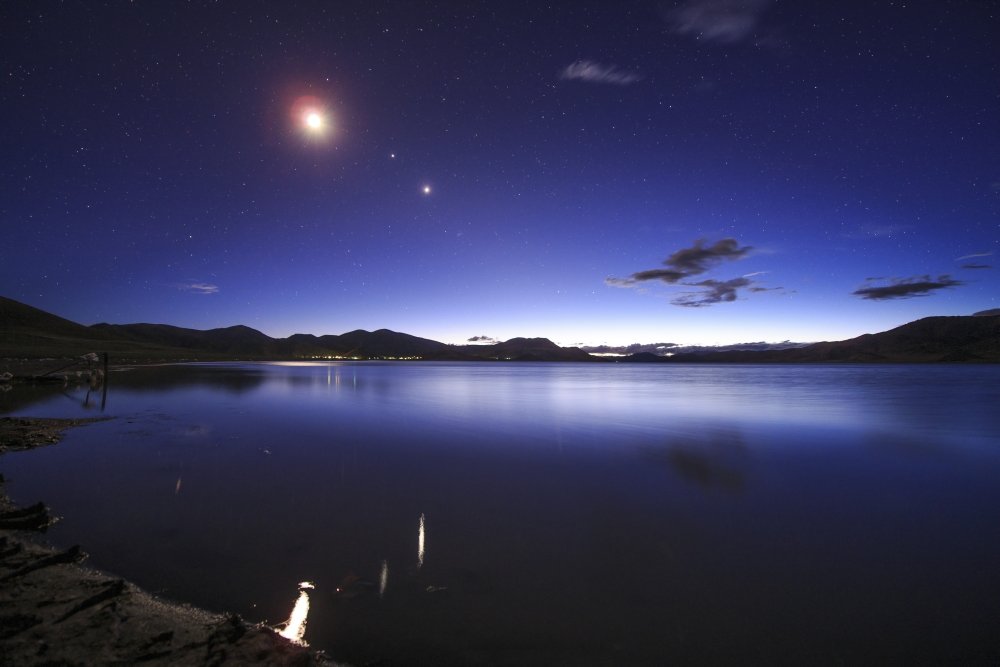 Conjunction of the moon Jupiter and Venus above Yamdrok Lake in Tibet China Poster Print by Jeff DaiStocktrek Images (34 x 22)