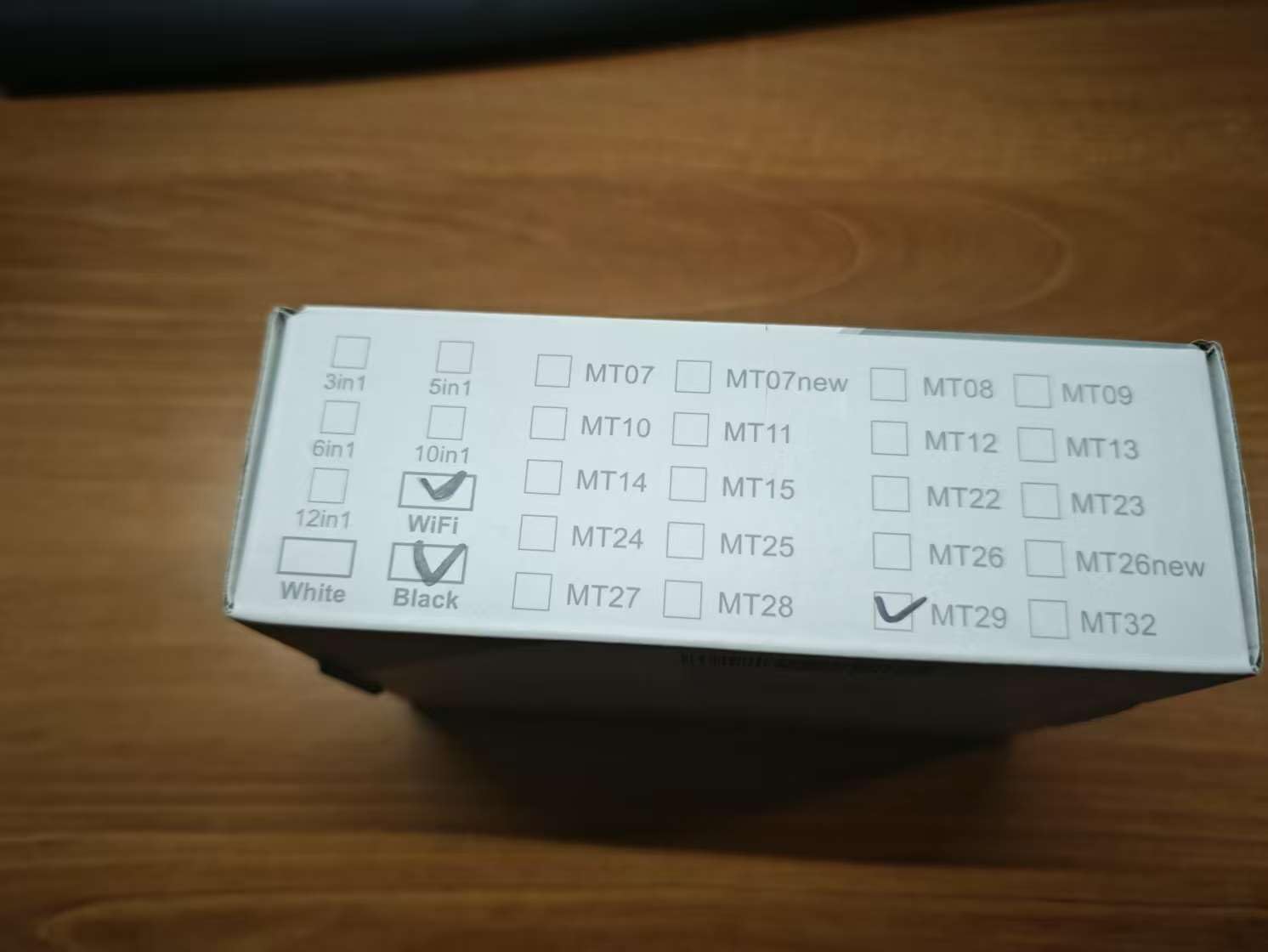 Top view of the product packaging showing a checkbox for MT29 indicating the model