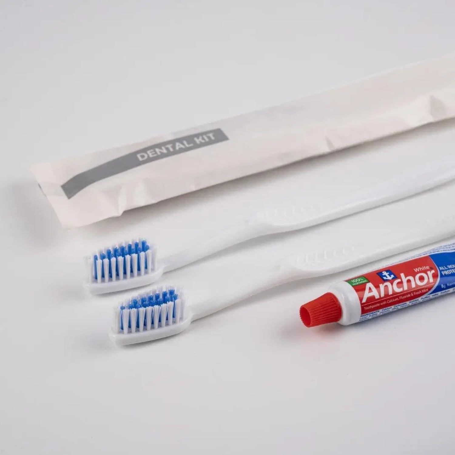 Polism Hotel Dental Kit with Anchor Toothpaste, 2 Toothbrushes, White Pouch, Double Occupancy Guest Amenities | Ideal for Hotels, Guest Houses, Airbnb, Spa, Hospitals & Marriage Halls