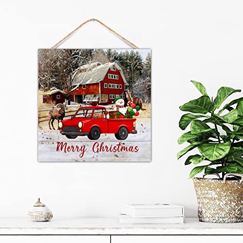 Camion d'hiver et vieille voiture sur panneau en bois rustique de Noël