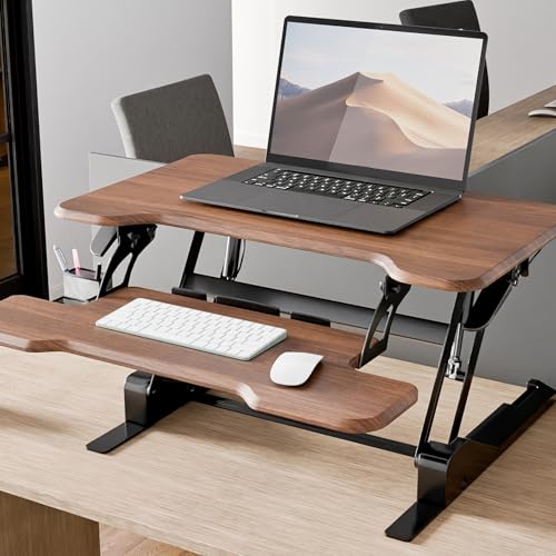 Image of Mount-It! Height Adjustable Standing Desk Converter, Compact 30 inch Wide Tabletop Standing Desk Riser with Gas Spring, Desktop Stand Up Workstation with Keyboard Tray Fits Monitor or Laptop, Dark Walnut