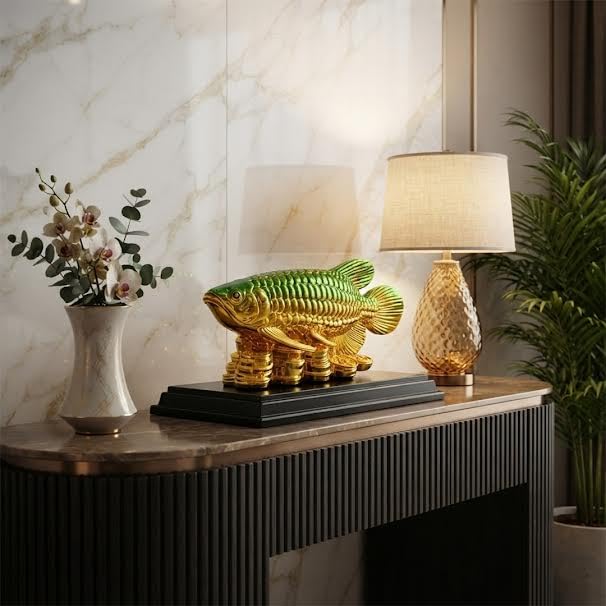 Image of Feng Shui Golden Arowana Fish Showpiece with Chinese Coins on Black Wooden Base | Green & Red Gradient Finish | Wealth & Prosperity Decor for Home, Office & Shop